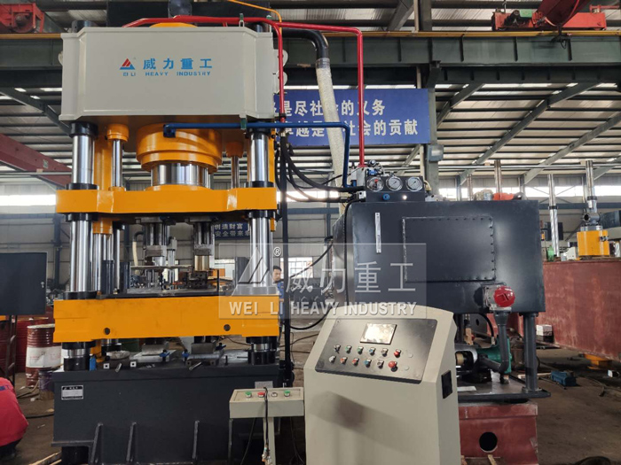 全自動(dòng)630噸石墨粉末壓塊機(jī)